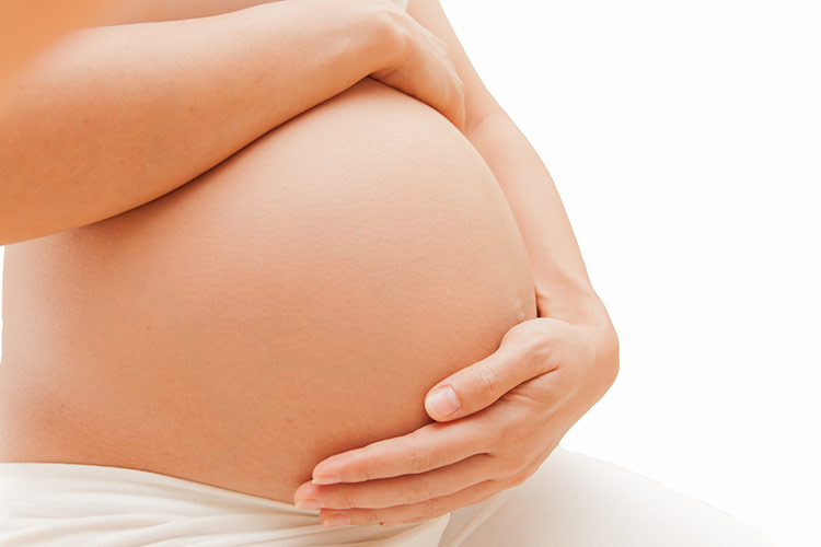 Těhotenské bříško těsně před porodem | Foto: Shutterstock